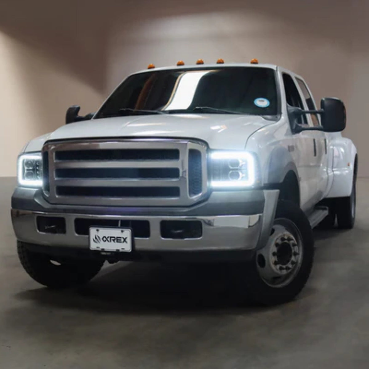 Ford Super Duty/Excursion: Multicolor Flow Series Alphablack Headlights (2005-2007) | Alpharex – Custom Multicolor LED Lighting by RGB Halo Kits