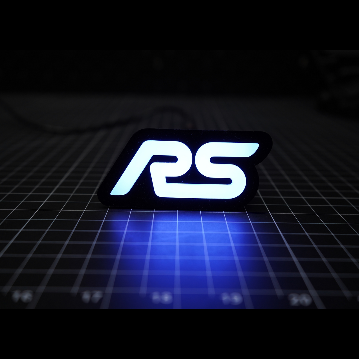 RS : Multicolor Flow LED Badge (15-18 Ford Focus) | Lit Logos – Custom Multicolor LED Lighting by RGB Halo Kits