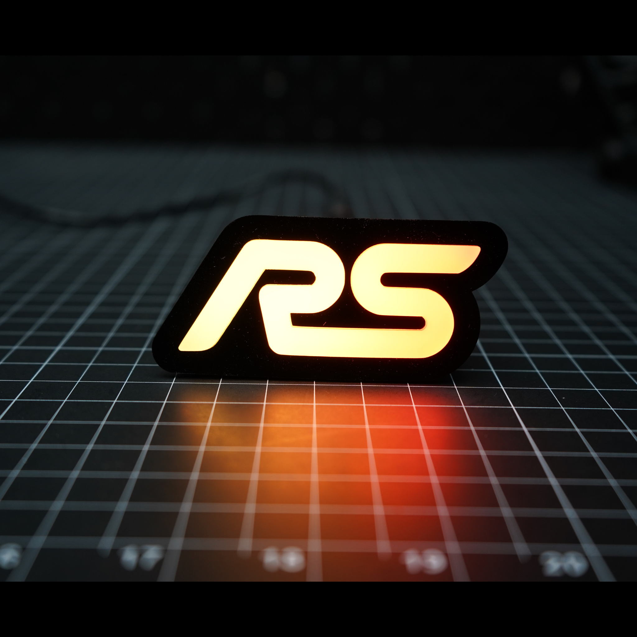 RS : Multicolor Flow LED Badge (15-18 Ford Focus) | Lit Logos – Custom Multicolor LED Lighting by RGB Halo Kits