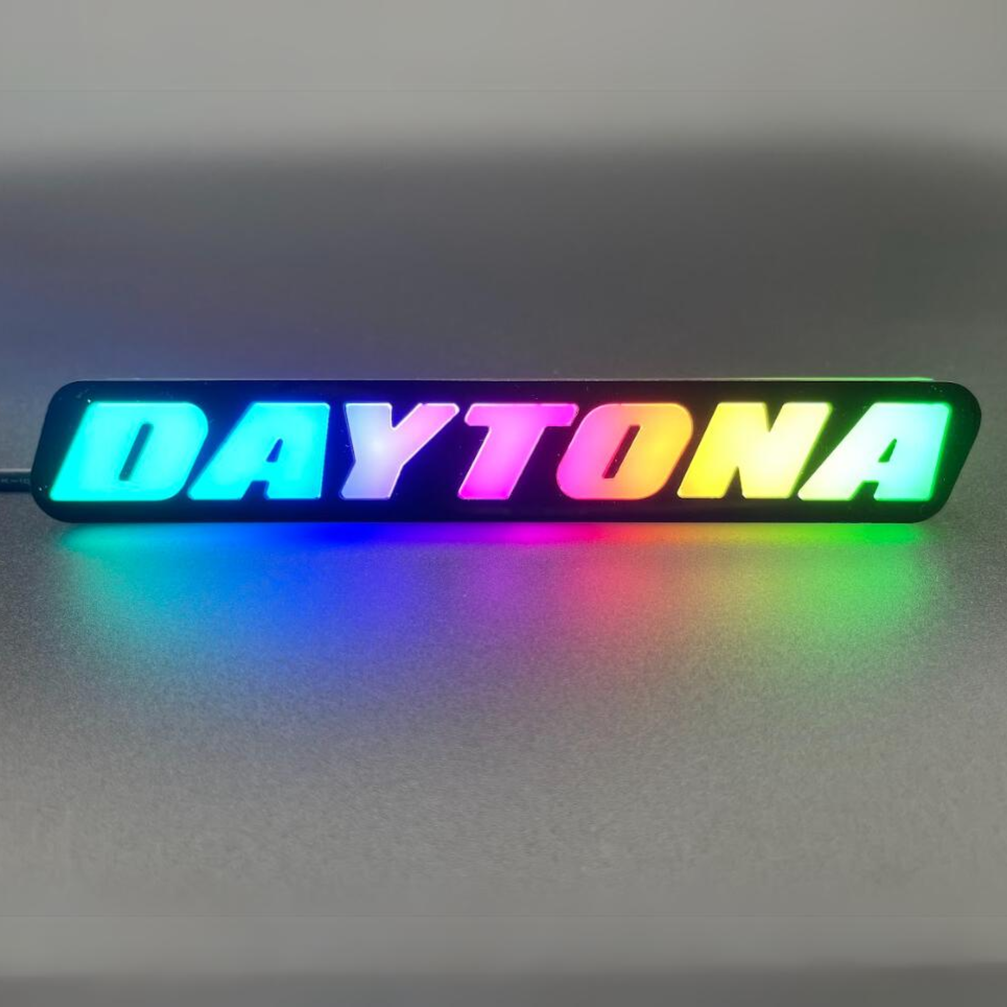 Daytona LED Badge: (Multicolor)