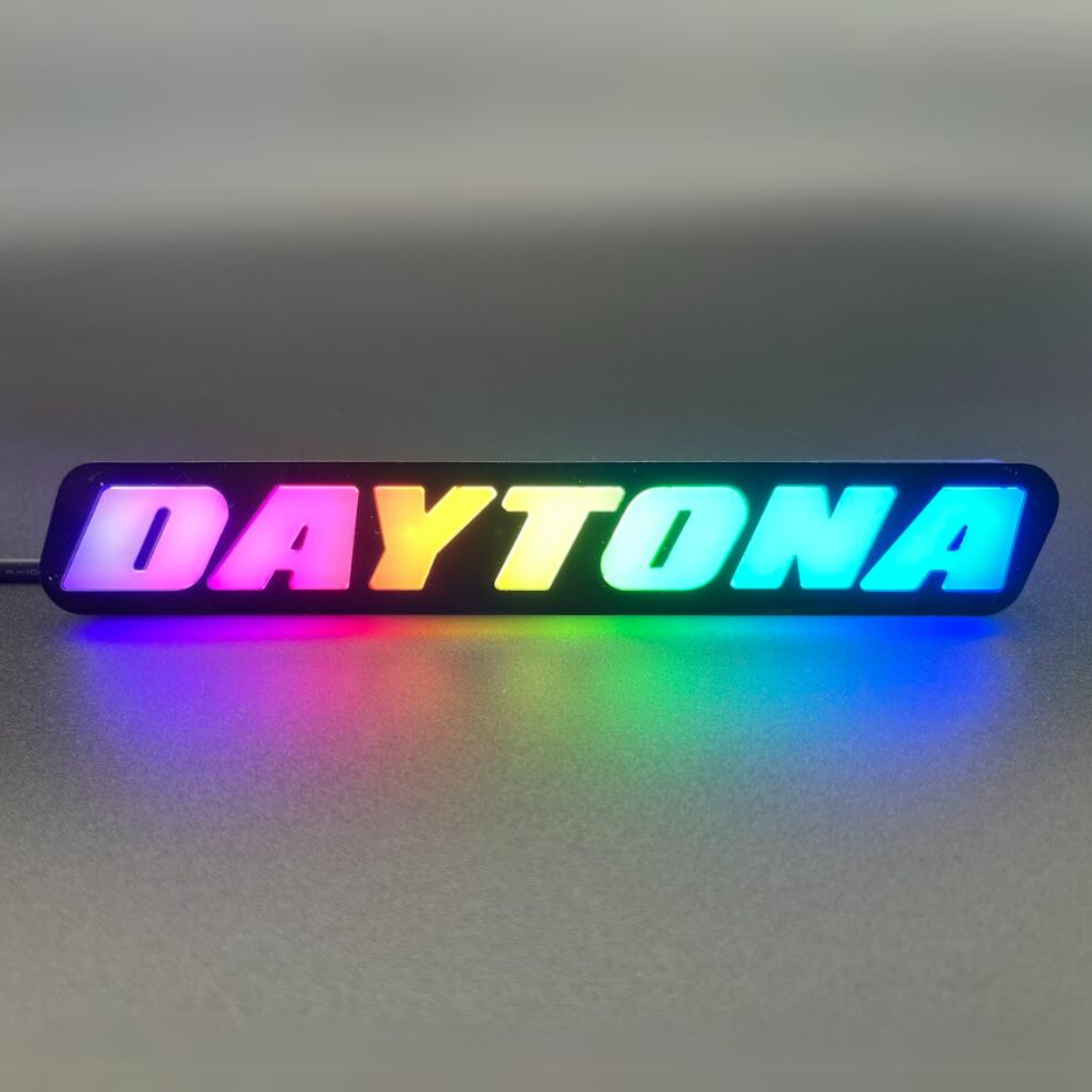 Daytona LED Badge: (Multicolor)