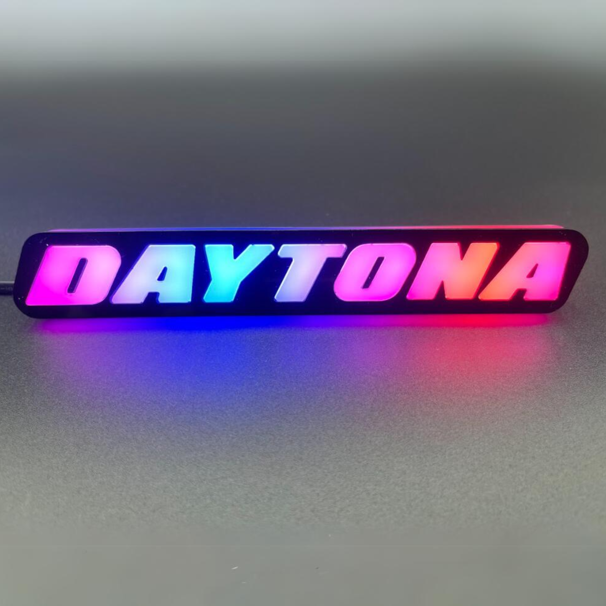 Daytona LED Badge: (Multicolor)