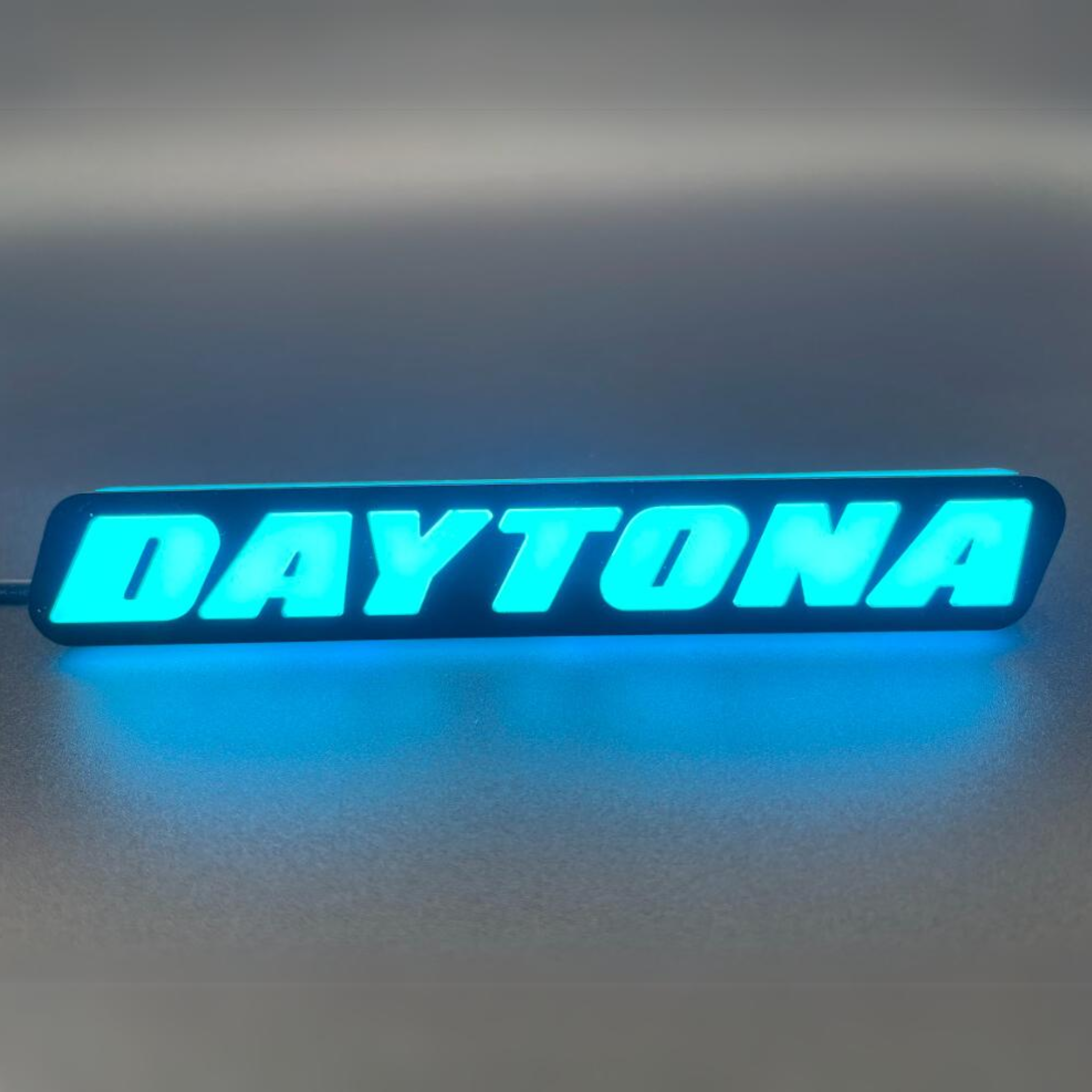 Daytona LED Badge: (Multicolor)