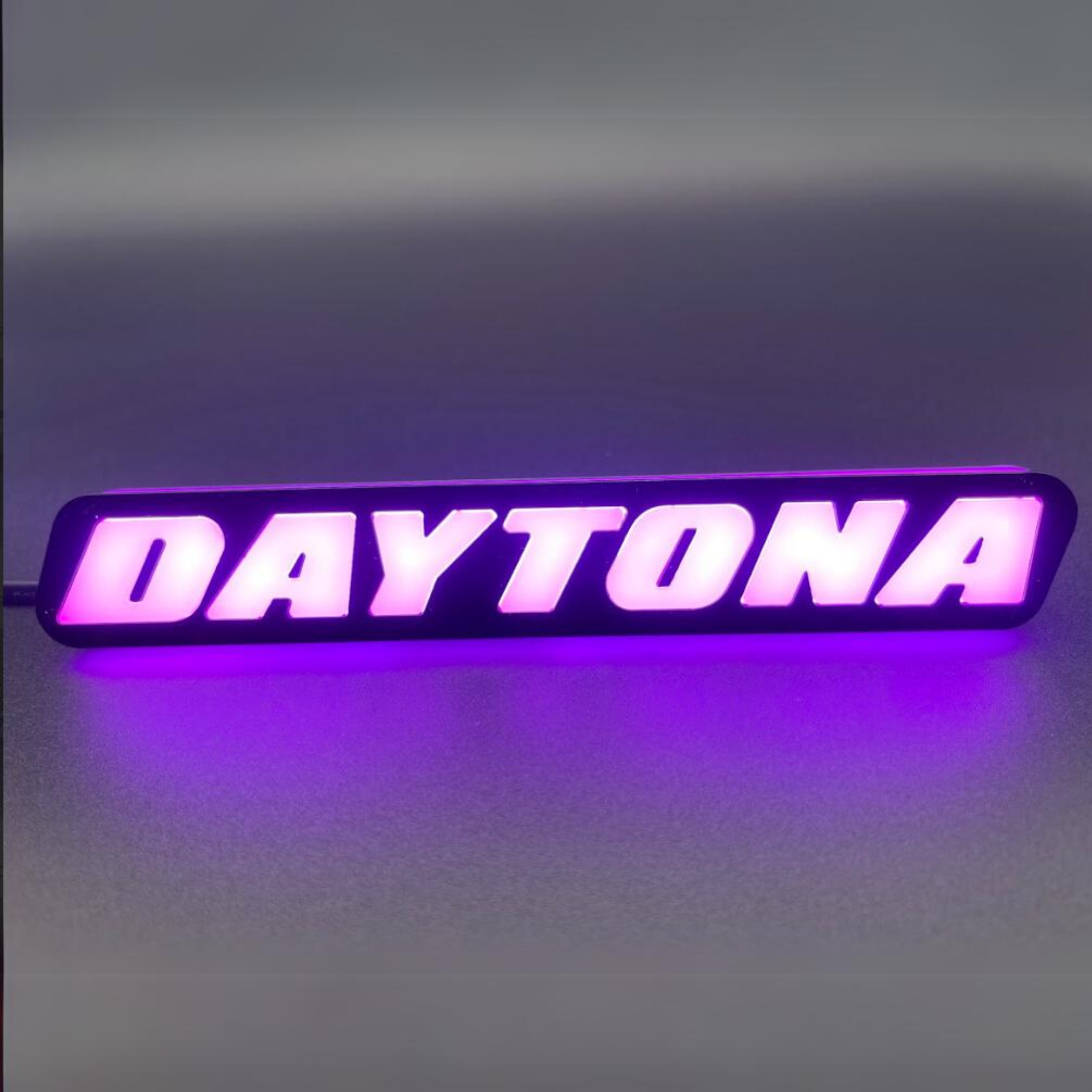 Daytona LED Badge: (Multicolor)