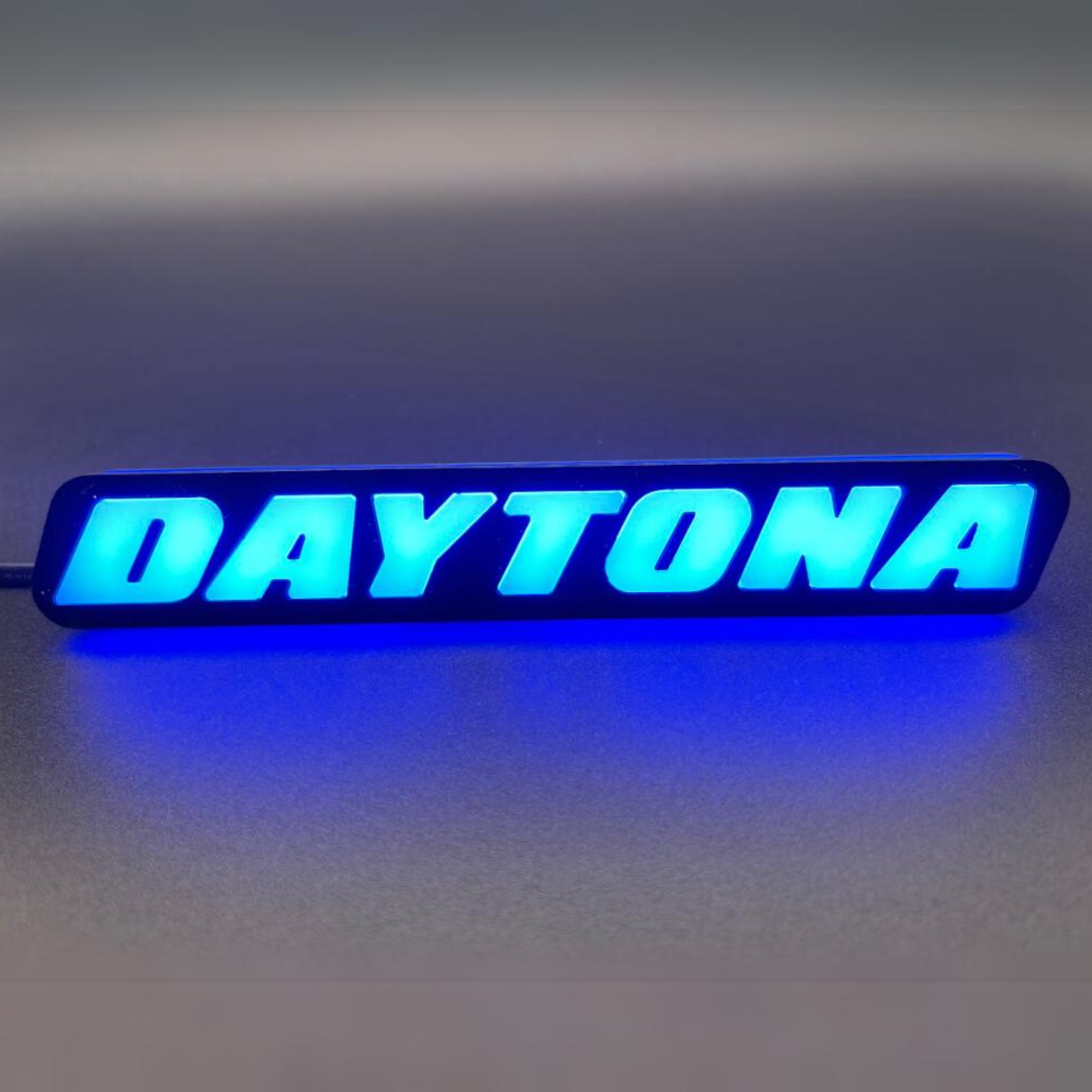 Daytona LED Badge: (Multicolor)