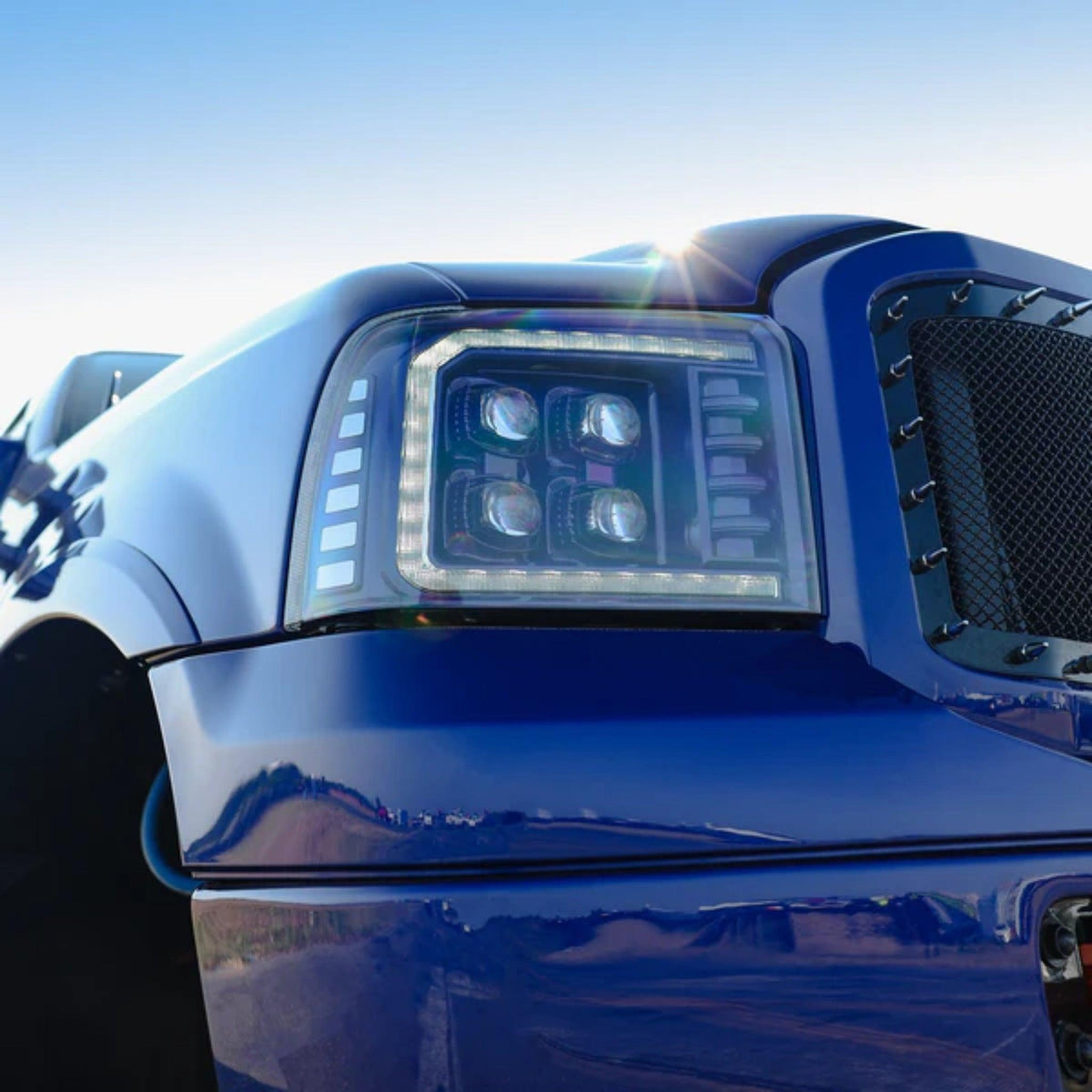 Ford Super Duty/Excursion: Multicolor Flow Series Alphablack Headlights (2005-2007) | Alpharex – Custom Multicolor LED Lighting by RGB Halo Kits