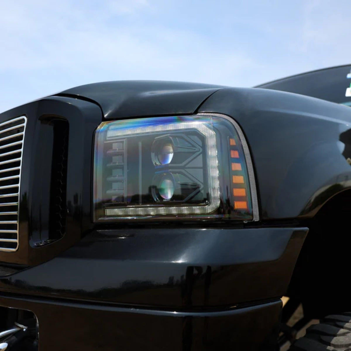 Ford Super Duty/Excursion: Multicolor Flow Series Alphablack Headlights (2005-2007) | Alpharex – Custom Multicolor LED Lighting by RGB Halo Kits