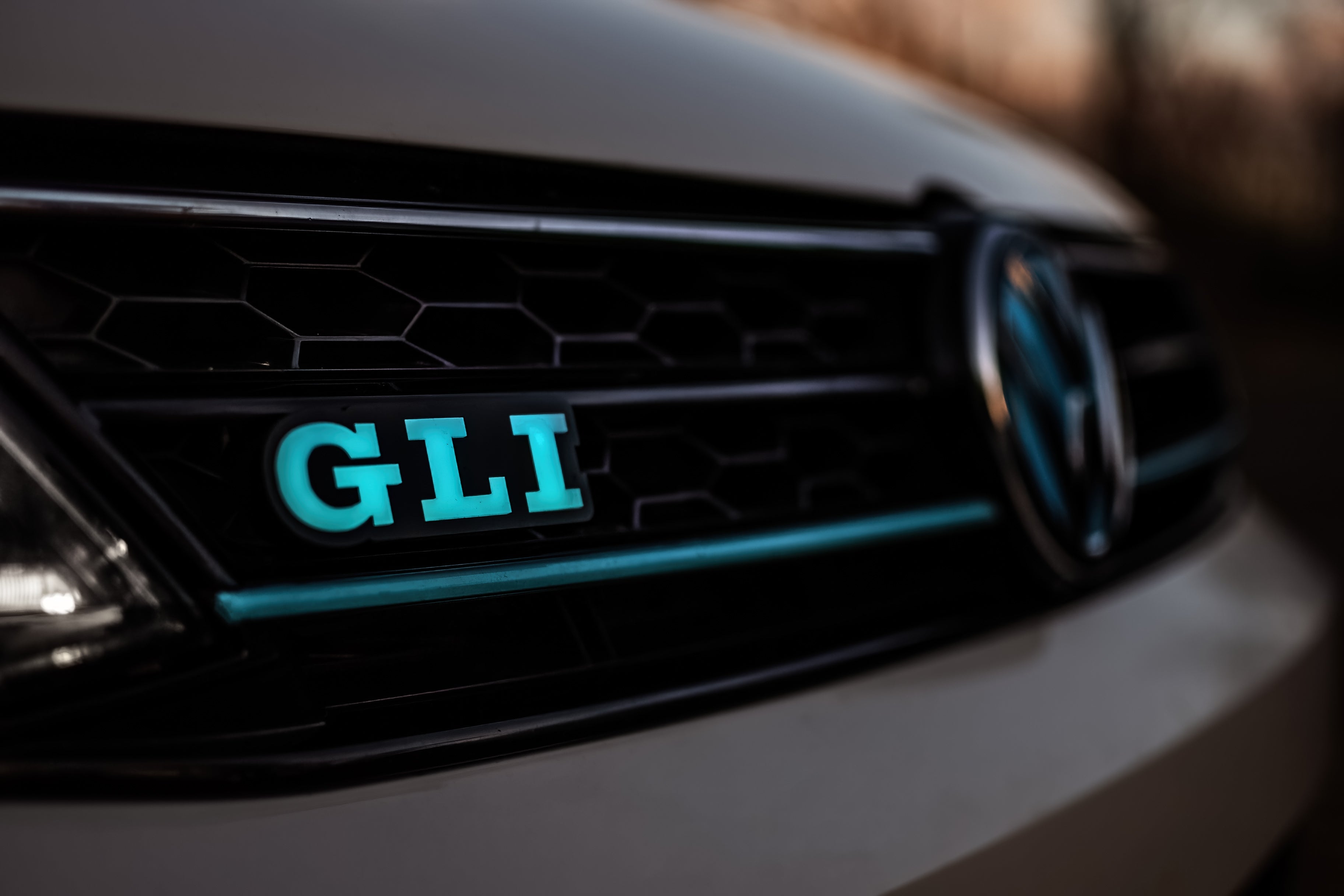 GLI : Illuminated Multicolor Flow LED Badge | Lit Logos â€“ Custom Multicolor LED Lighting by RGB Halo Kits
