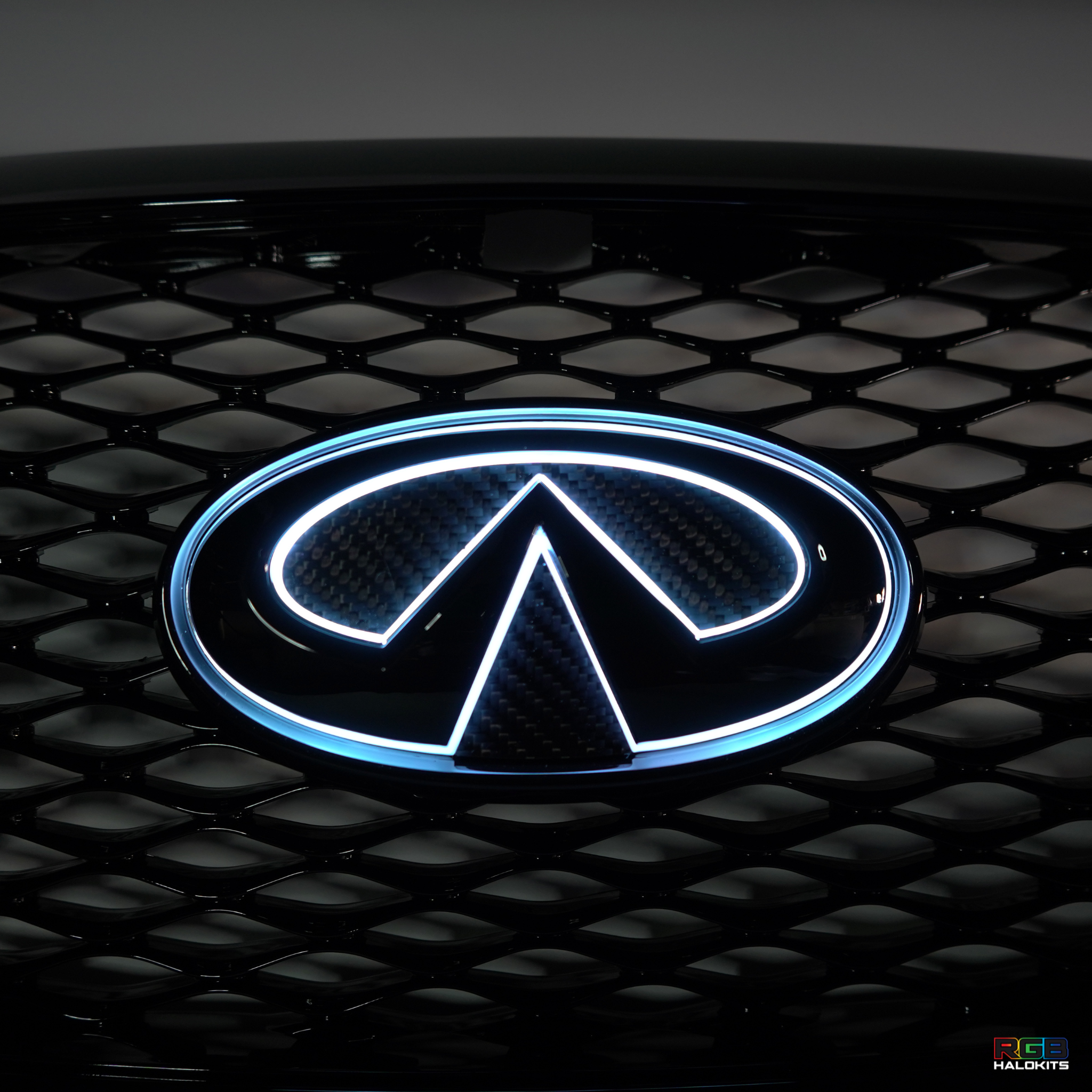 Infiniti Q60 RGB LED Emblem (2014-2022) â€“ Custom Multicolor LED Lighting by RGB Halo Kits