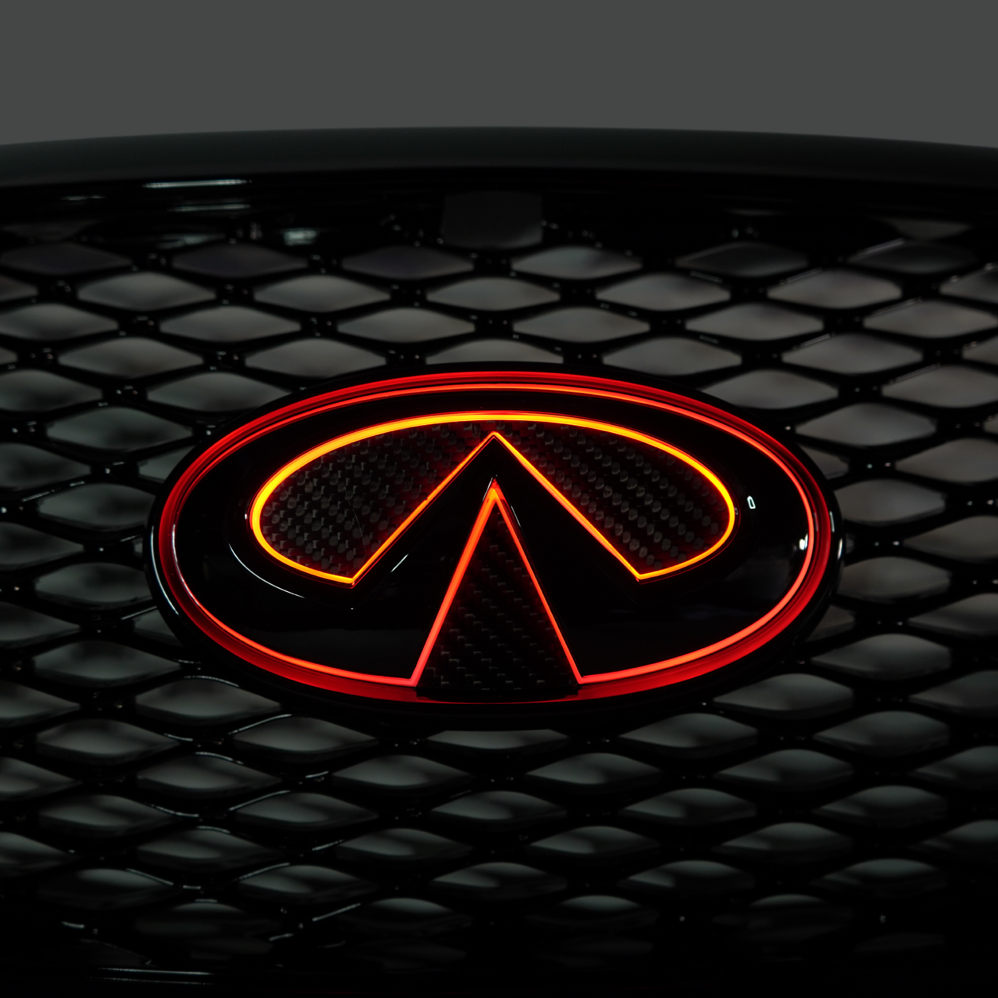 Infiniti Q60 RGB LED Emblem (2014-2022) â€“ Custom Multicolor LED Lighting by RGB Halo Kits