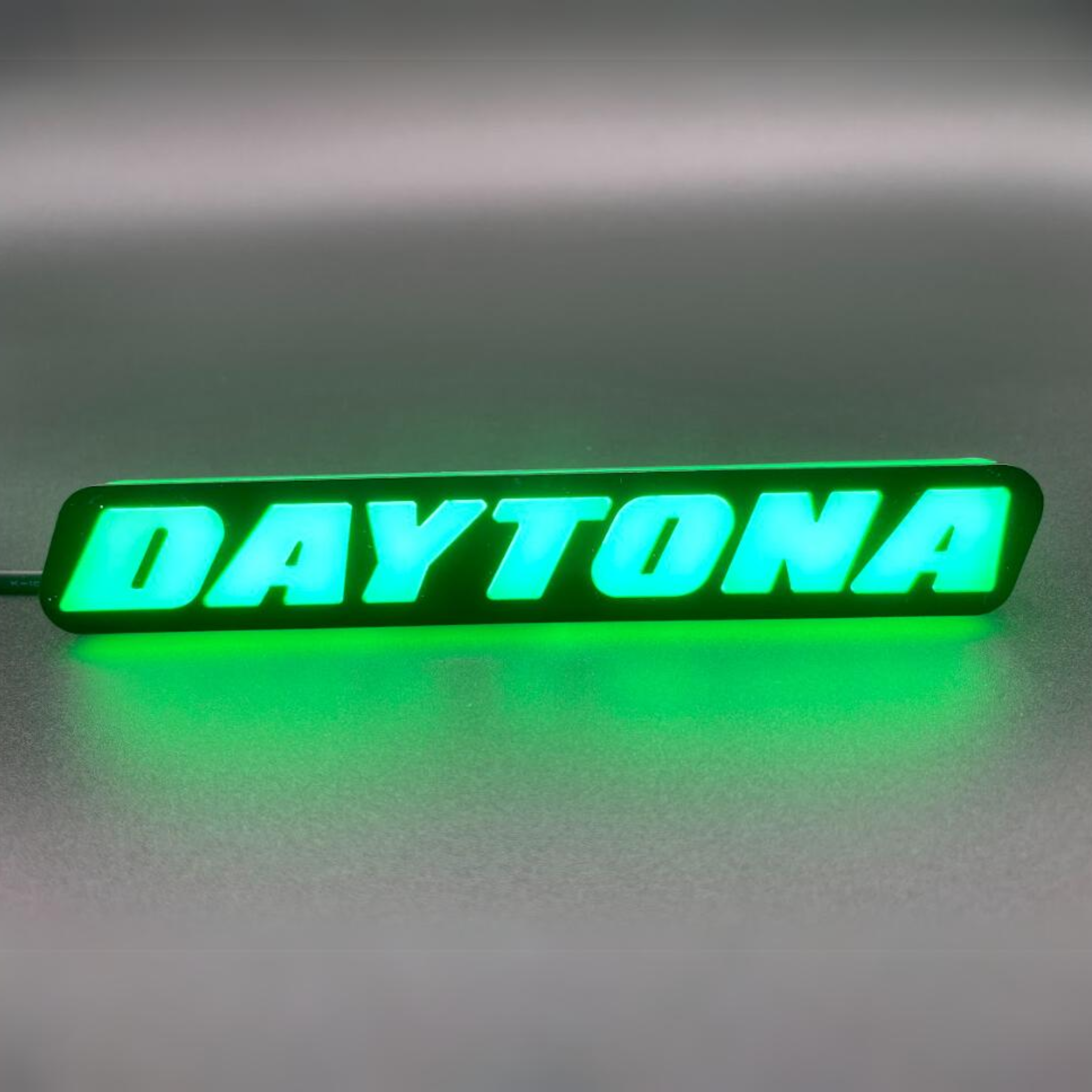 Daytona LED Badge: (Multicolor)