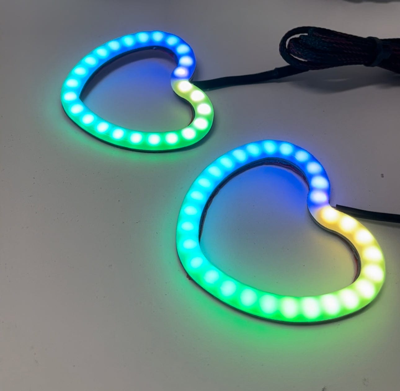 Heart Halo Rings | Multicolor - RGB Halo Kits Multicolor Flow Series Color Chasing RGBWA LED headlight kit Oracle Lighting Trendz OneUpLighting Morimoto theretrofitsource AutoLEDTech Diode Dynamics