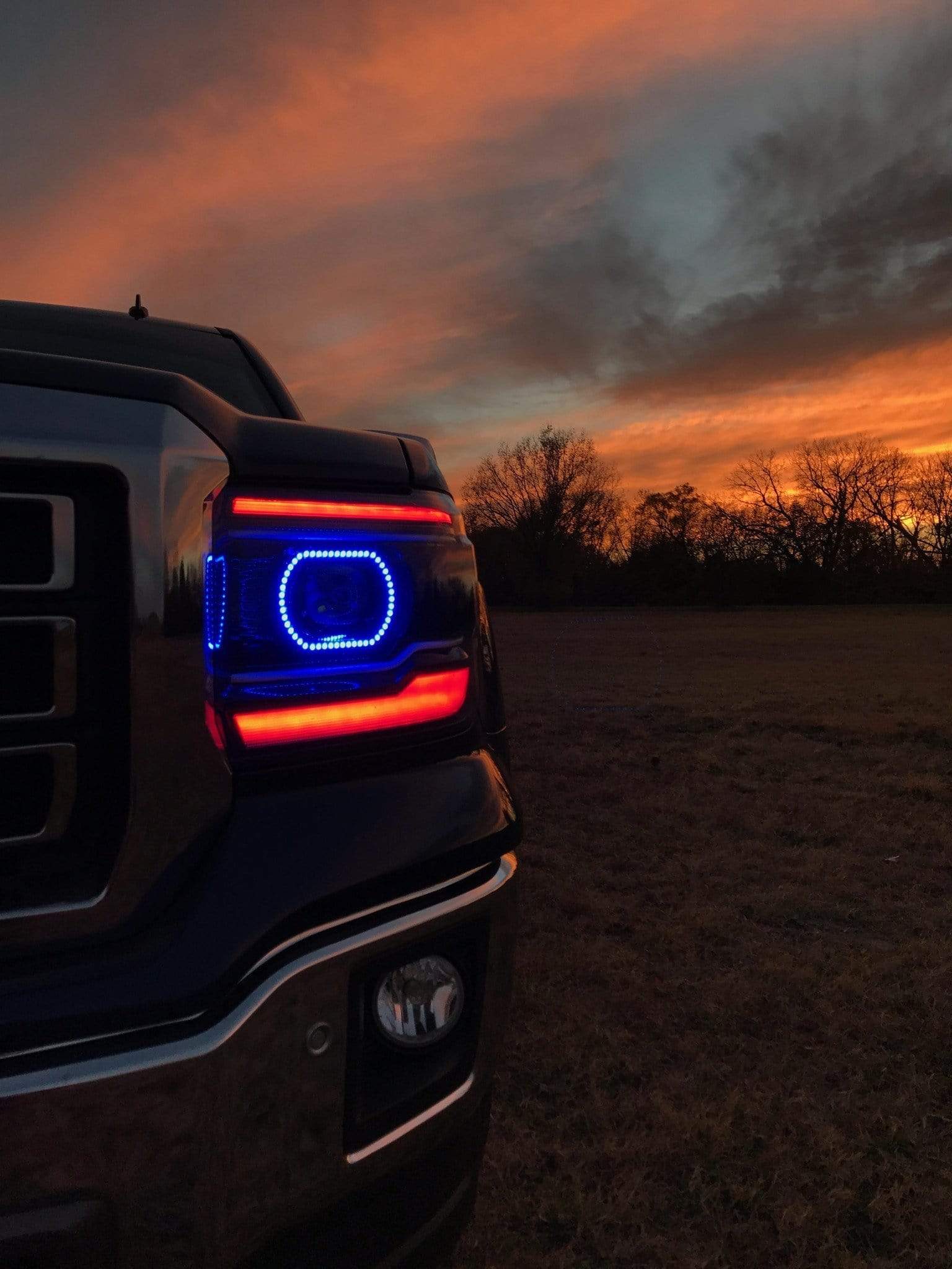 2014-2017 GMC Sierra 1500HD Multicolor Halo Kit - RGB Halo Kits Multicolor Flow Series Color Chasing RGBWA LED headlight kit Oracle Lighting Trendz OneUpLighting Morimoto theretrofitsource AutoLEDTech Diode Dynamics